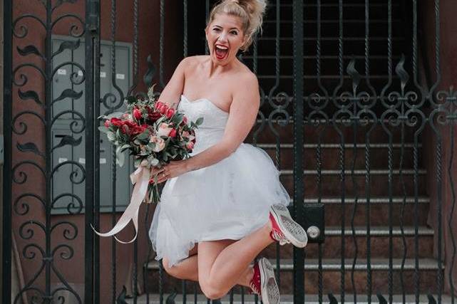 Jump shot of the bride