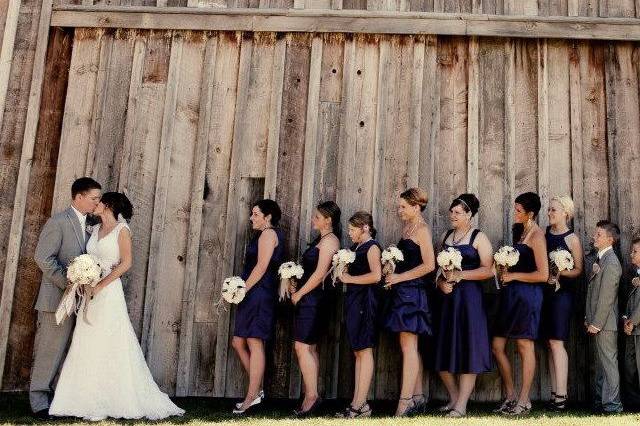 The couple with the bridesmaids and groomsmen