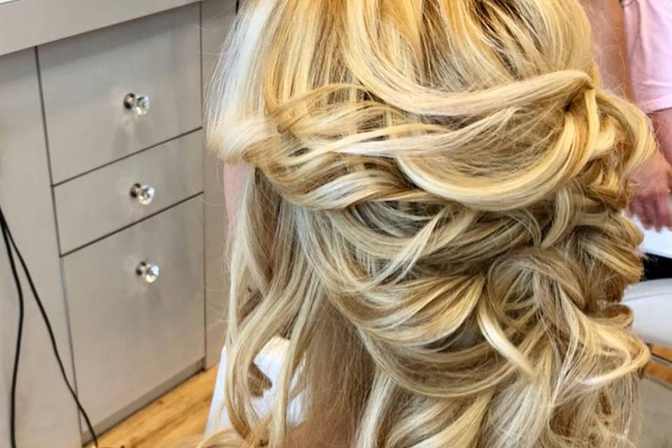 Half updo with loose curls