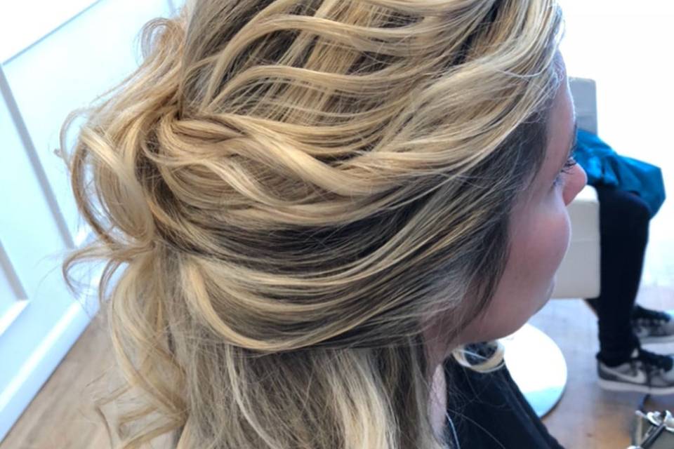 Half updo with loose curls