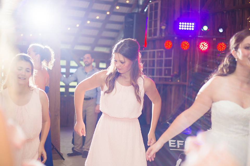 The bridesmaids dancing