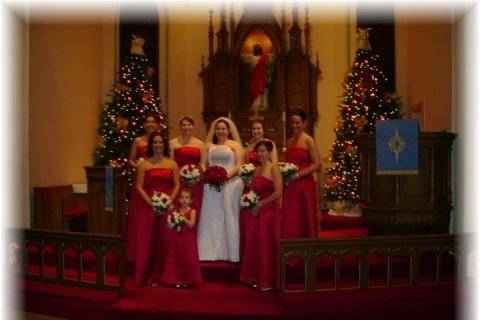 The church is beautifully decorated for this holiday wedding Party