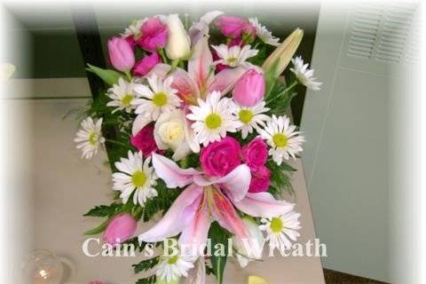 Wonmderful fragrant stargazer lilies in thisz bridal bouquet