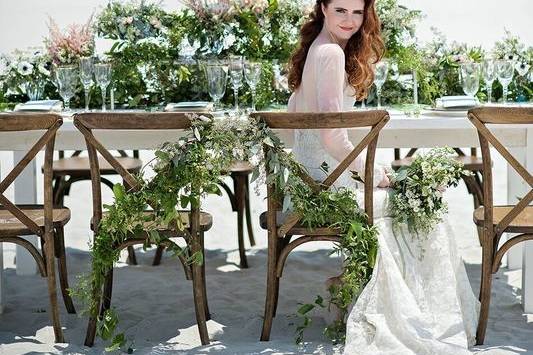 Bride at the table by the beach