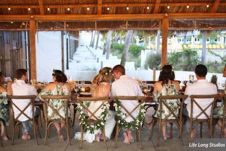 https://cdn0.weddingwire.com/vendor/976181/3_2/960/jpg/tropical-boho-wedding-at-postcard-inn-on-st-pete-beach-florida-94-768x512_51_181679-1564878917.jpeg