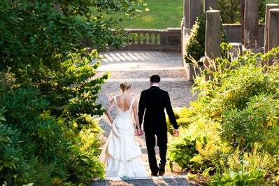 Couple leisurely walk hand in hand​