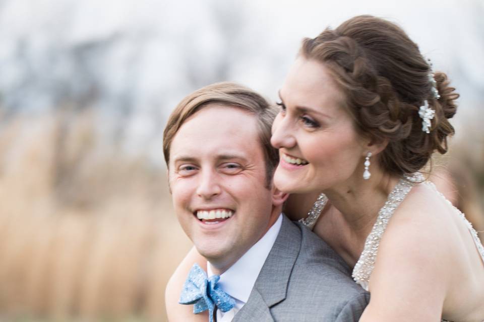 Bride and groom hugs