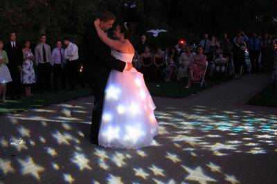 The First Dance with a Custom Introduction and Groom Voiceover and Specialty Lighting!