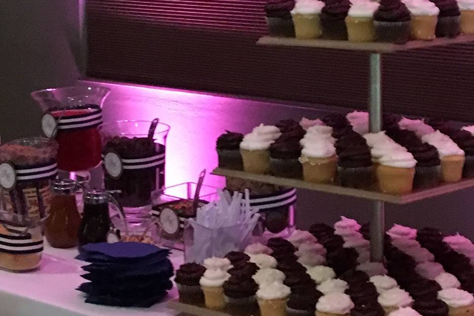 Dessert table with custom cupcake stand