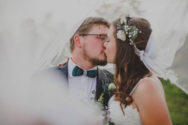 Newlyweds kissing