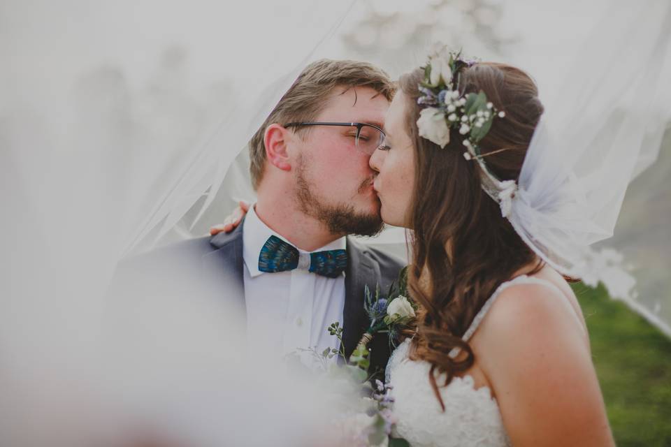 Newlyweds kissing