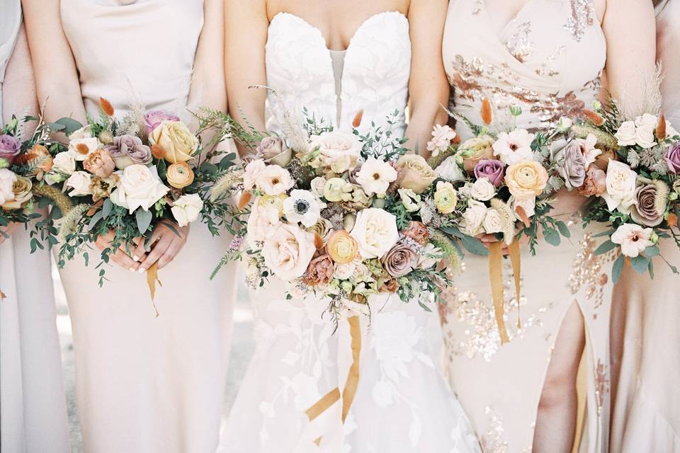Holding the bouquets