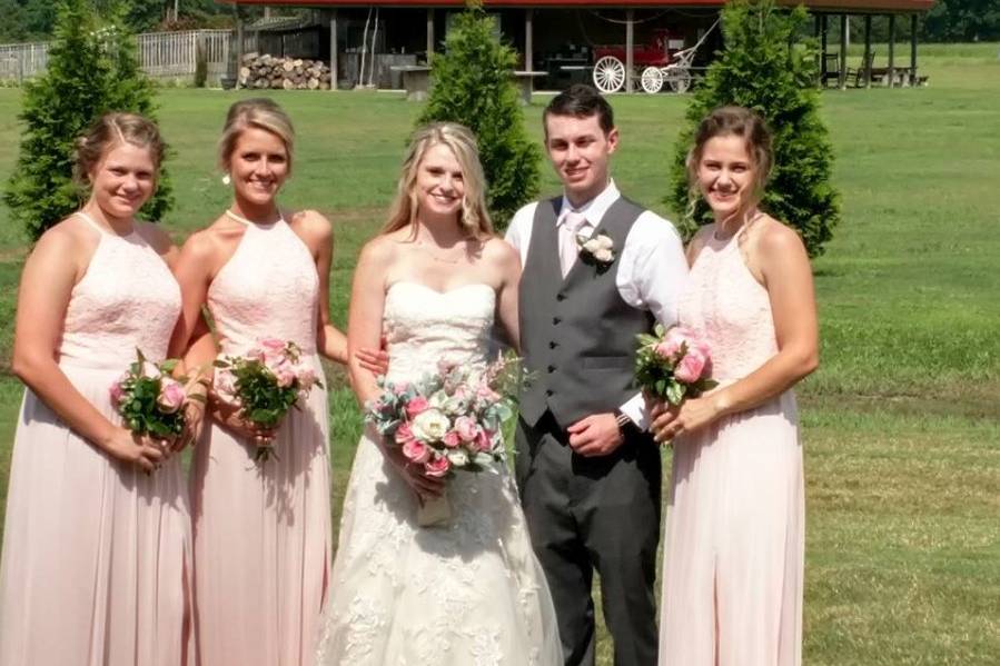 Newlyweds and the bridesmaids