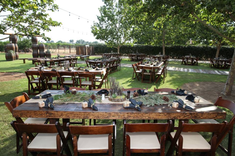 Farm tables and fruitwood chairs