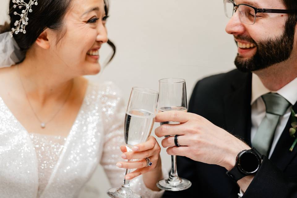 Bride and groom toasting