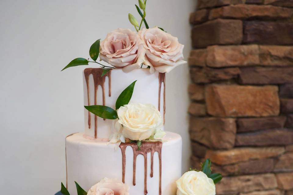 Rose gold drip and navy cake