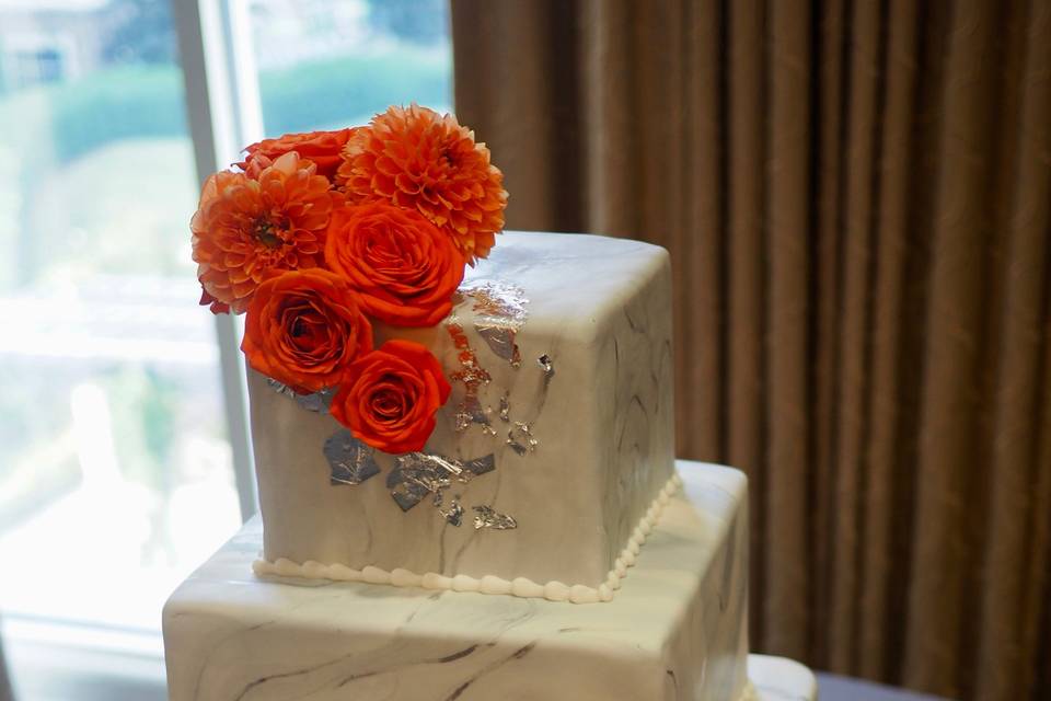 Marbled cake with silver leaf