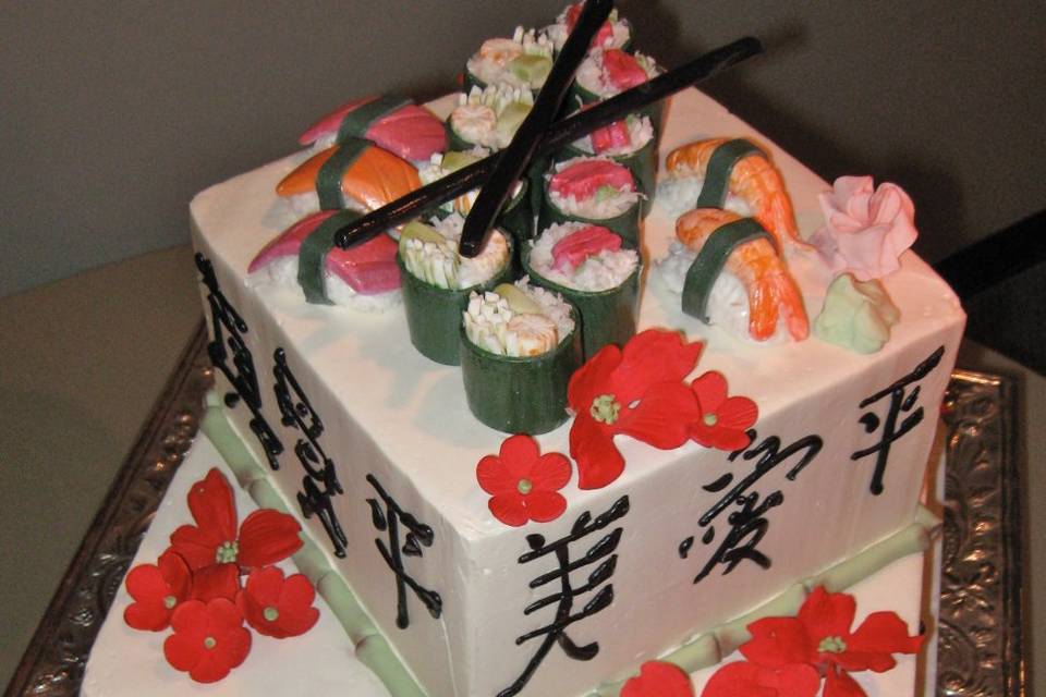 For the sushi lover! All hand made gum paste sushi adorn this buttercream iced cake.