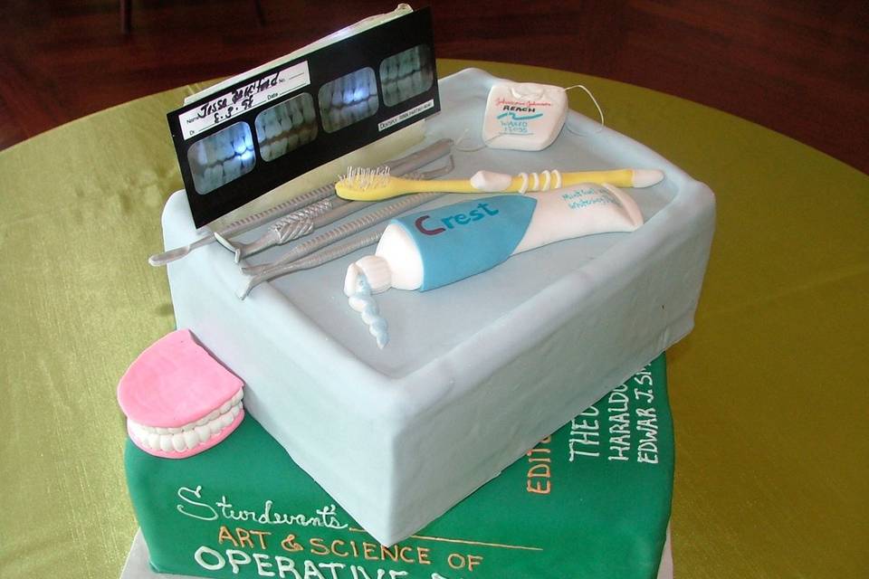 Dental themed groom's cake. X-rays are actually the grooms from when he was younger!