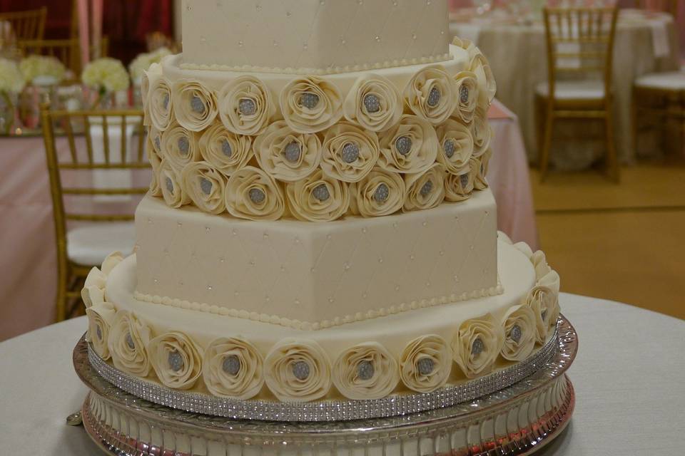 These rolled flowers took over 40 hours to create but the result was stunning! Ivory and silver beauty at the Greek Orthodox Church