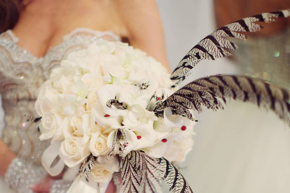 A wedding bouquet w/feathers