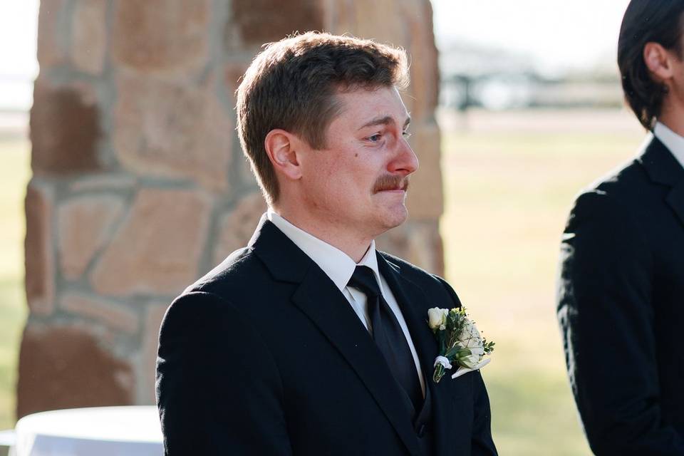Groom reaction ceremony aisle
