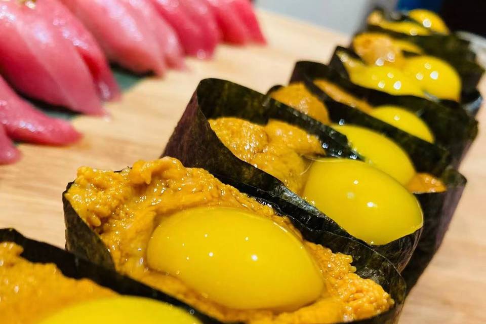 Uni Nigiri with quail eggs