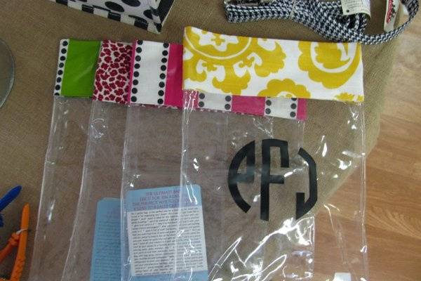Adorable storage bags made of heavy duty vinyl and trimmed in laminated fabric with a velcro closure. May be personalized with vinyl monogram. A great gift for brides for their lingerie or honeymoon. Available in 1 gallon and 2 gallon sizes and 75 fabrics!