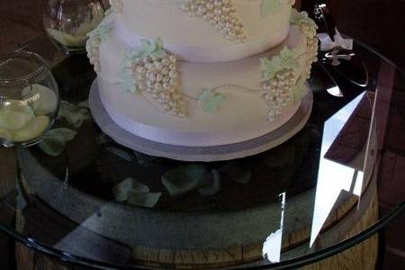 Three tier white wedding cake