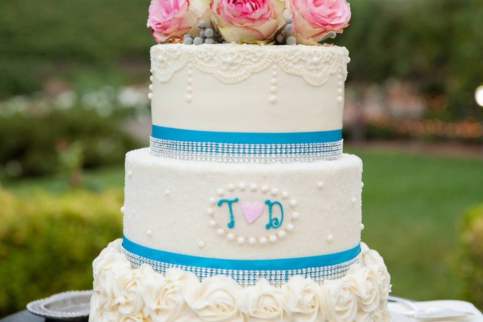 Three tier wedding cake with blue lining