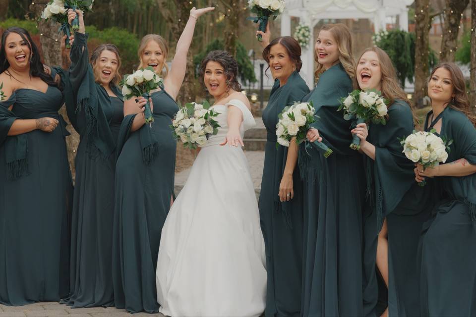 Posing with her bridesmaids.