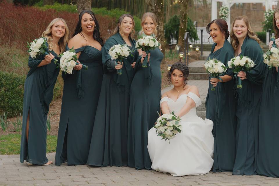 Posing with her bridesmaids.