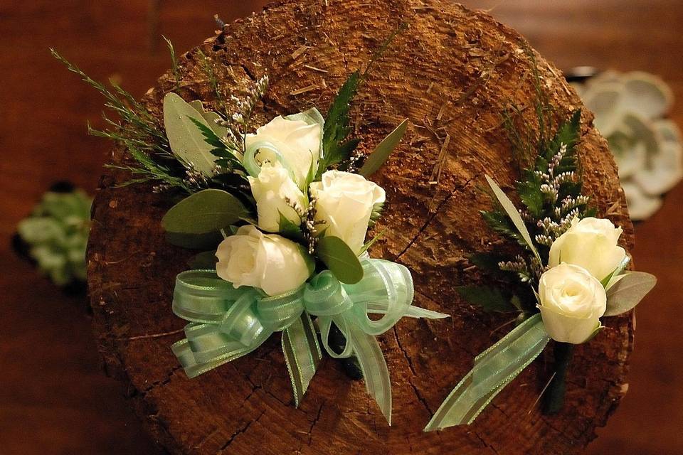 White corsage and boutonniere