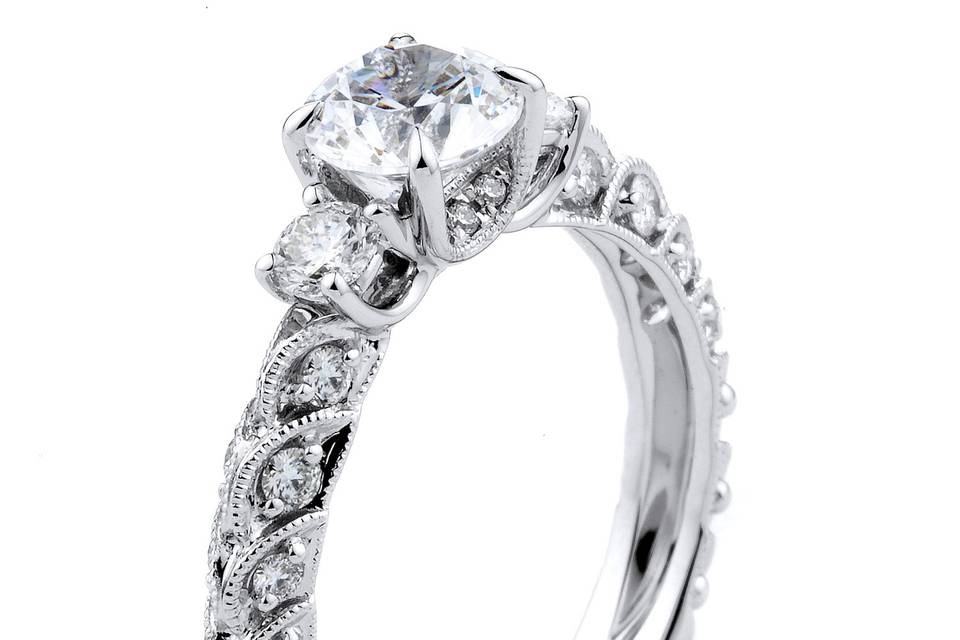 Style Supreme Jewelry	154240 <br> 18K white gold vintage-inspired Desireé Collection engagment ring featuring 0.23 carats of round diamonds
