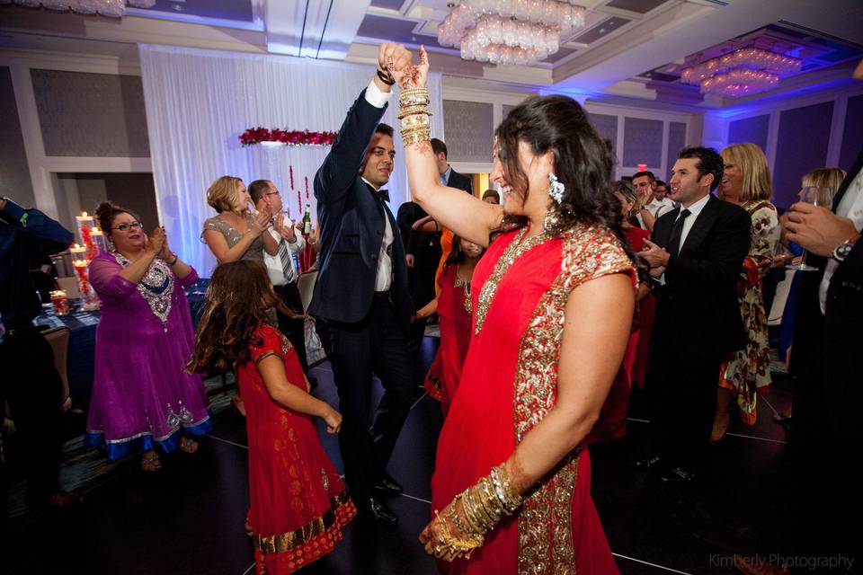 Couple and guests on the dance floor