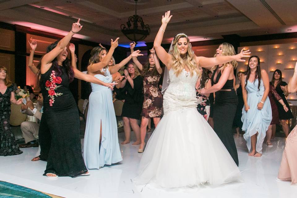 Bride and bridesmaids performing