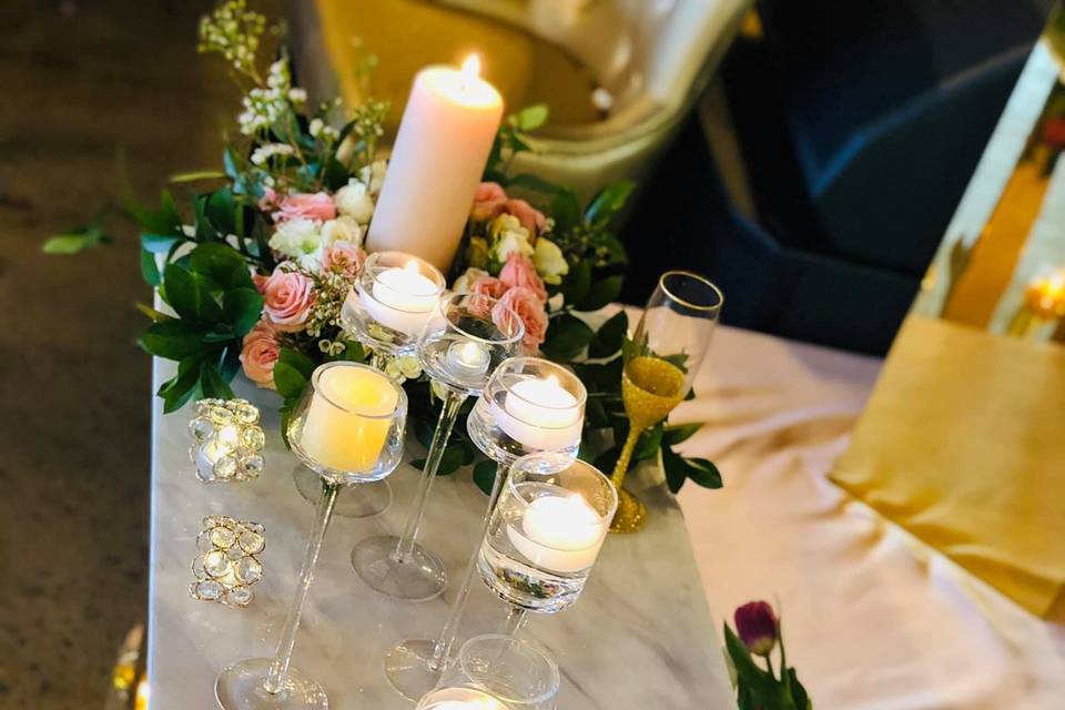 Candle and floral sweetheart table