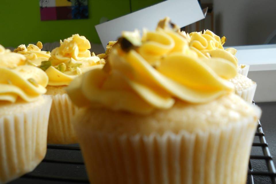 Cardamon Saffron kulfi - Cardamom cupcakes with Saffron buttercream adorned with pistachios.