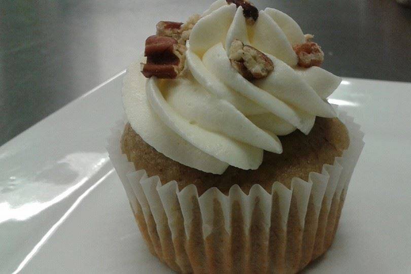 Hummingbird Cupcakes
Banana, pineapple and pecan cupcake topped with cream cheese frosting and garnished with toasted pecans.