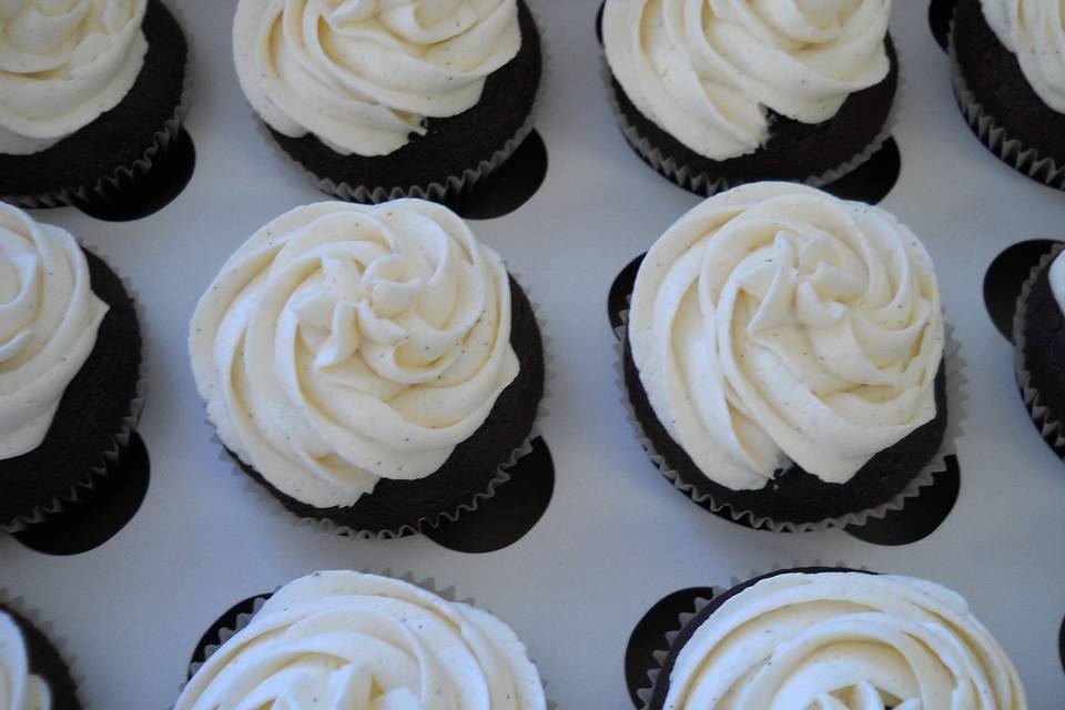 Valrhona Chocolate Pumpkin with a hint of Coconut milk topped with Vanilla Bean buttercream.