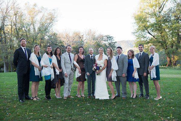 The couple with the bridesmaids and groomsmen