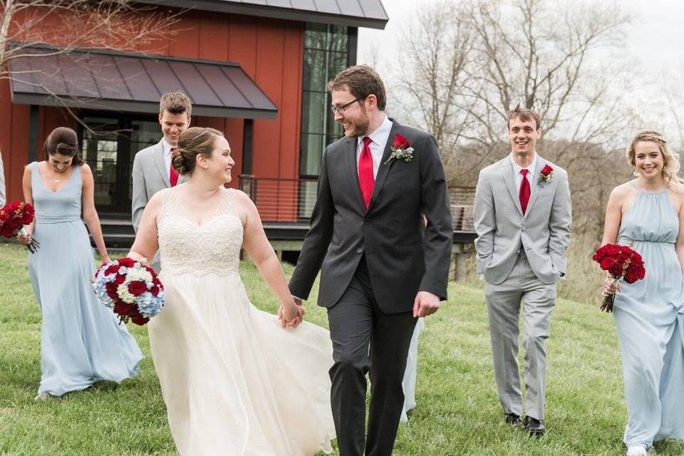 The couple with the bridesmaids and groomsmen