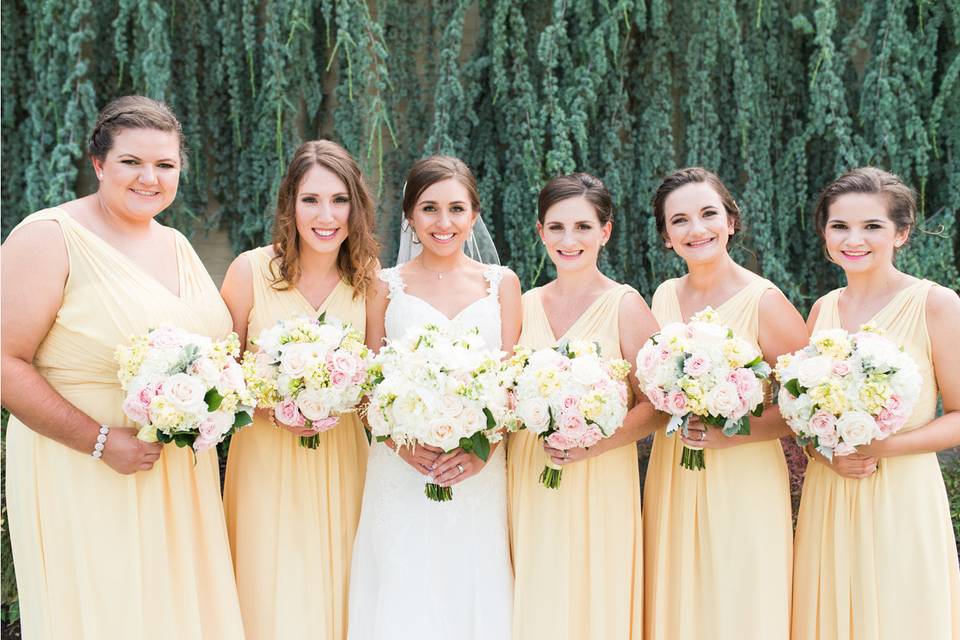 White roses to match their white dresses