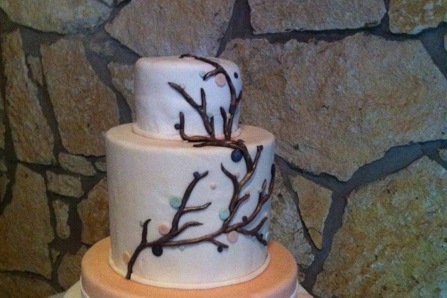 Wedding cake with rings on top