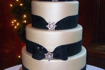 Wedding cake with black ribbons