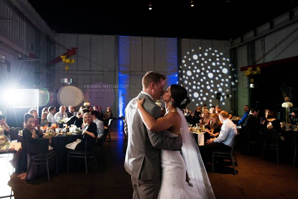 Newlyweds kiss at reception