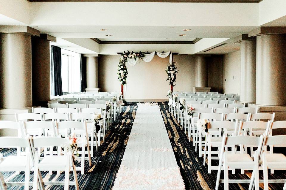 Pergola arch and white chairs