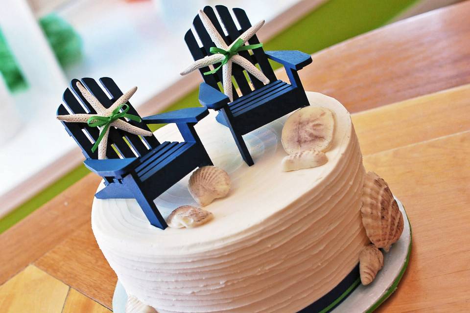 Simple beach wedding cake with chocolate seashells