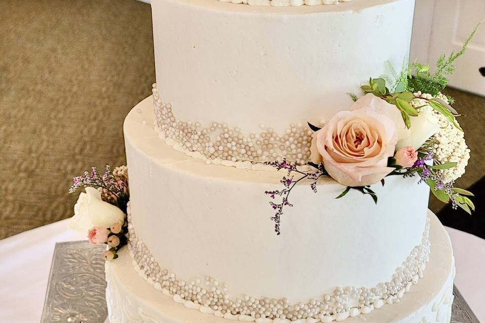 Lace accented white cake