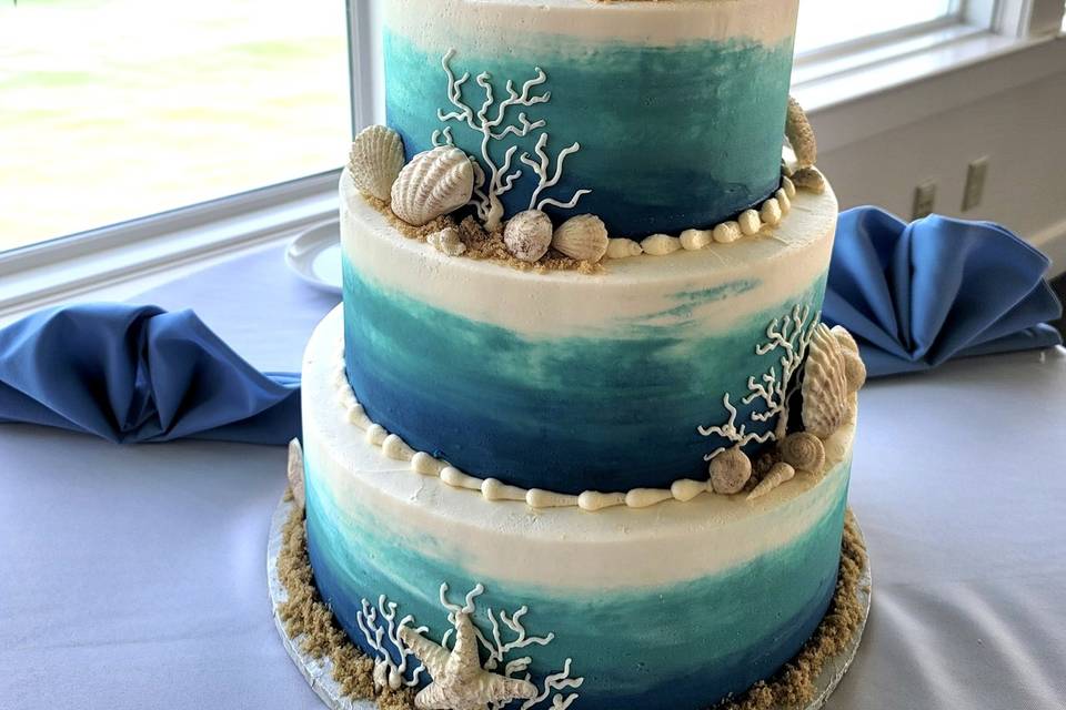 Ocean watercolor tiered cake
